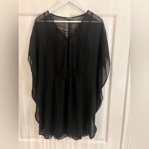 Black slip dress with attached cape